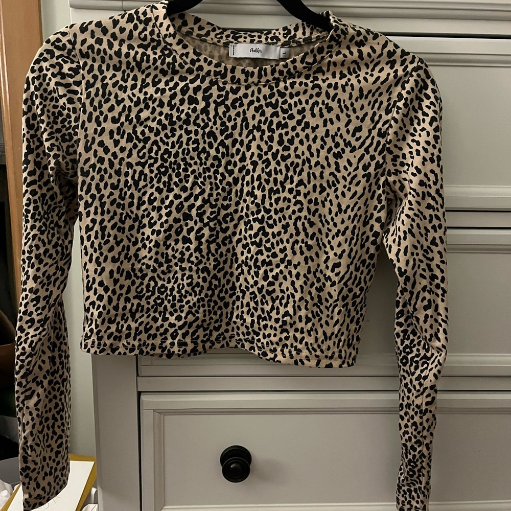 Slightly cropped Adika long sleeve cheetah top